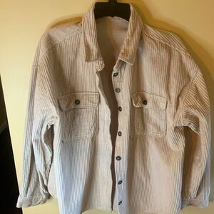 Tan corduroy style button down shirt/jacket.